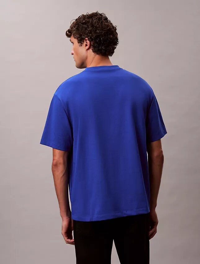 T-Shirt mit Block-Logo-Grafik in lockerer Passform T-Shirt mit Block-Logo-Grafik in lockerer Passform