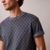T-Shirt mit durchgehendem Monogram und lockerer Passform