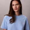 T-Shirt mit Schriftzug von Calvin Klein in Schreibschrift T-Shirt mit Schriftzug von Calvin Klein in Schreibschrift