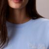 T-Shirt mit Schriftzug von Calvin Klein in Schreibschrift T-Shirt mit Schriftzug von Calvin Klein in Schreibschrift