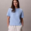 T-Shirt mit Schriftzug von Calvin Klein in Schreibschrift T-Shirt mit Schriftzug von Calvin Klein in Schreibschrift