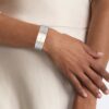 Uhr mit geometrischem Zifferblatt und Mesh-Armband Uhr mit geometrischem Zifferblatt und Mesh-Armband